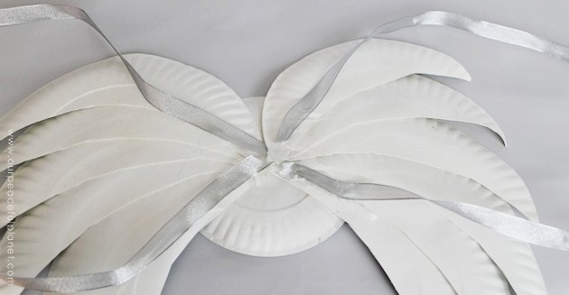 These lovely DIY angel wings are large enough for adults to wear and all you need are some paper plates and ribbon with a little glitter for extra magic. 