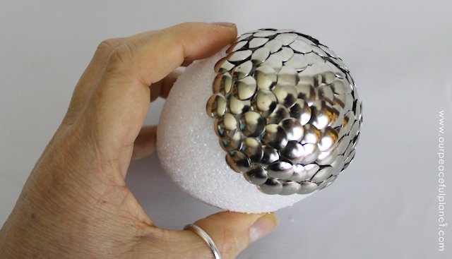 Make this gorgeous large dragon egg with nothing more than a Styrofoam egg and some push pins. 