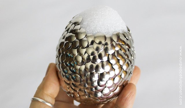 Whether you’re a dragon love, Game of Thrones fan or fantasy lover in general here is a simple inexpensive way to make a dragon’s egg! It’s beautiful enough to display anywhere and is sure to be a conversation piece! Supplies needed? Thumbtacks and a Styrofoam egg. Really!