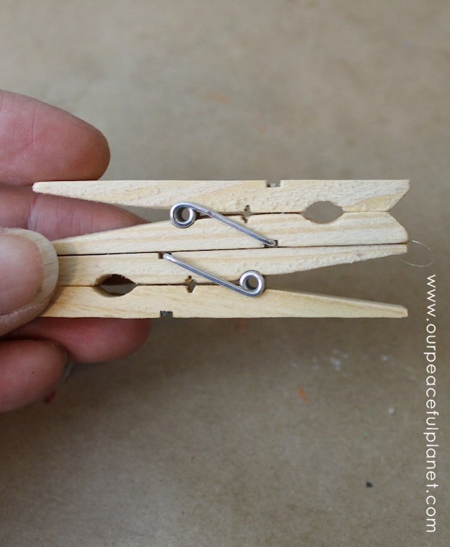 Everyone hates tangled earbuds! Here's a quick and simple way to make earbud holders using two clothespins. Customize them any color you like! A great gift!