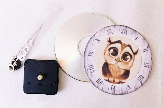 Who doesn't have old DVDs lying around? Well here’s is a spectacular upcycle use for them! Ends up they are perfect for turning into mini clocks. Just grab an inexpensive clock mechanism and DOWNLOAD OUR 12 FREE CLOCK FACE PATTERNS provided. 