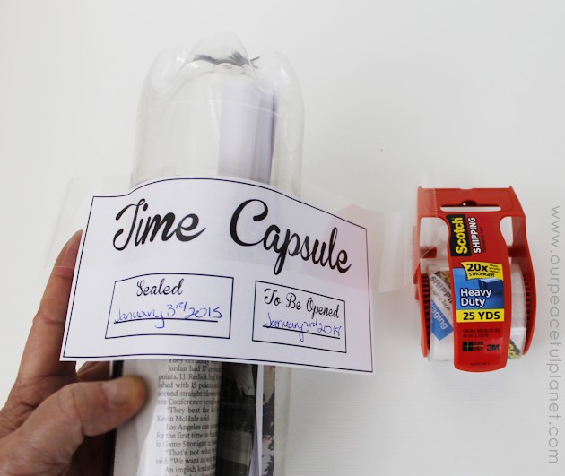 Make a fun family time capsule using plastic soda bottles and our free printables! We'll give you labels and ideas for other items to add into your capsule. 