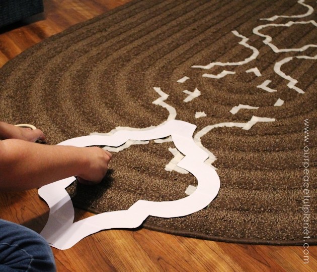 Yes, even carpets can get a makeover! Whether it’s a larger area rug or a throw rug, you can paint carpet using a stencil and regular interior latex paint.