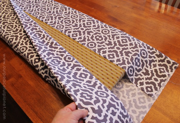 Upholstery pins are are an incredibly simple yet versatile tool for doing some quick no-sew recovering in your home. We recovered a window seat in minutes!