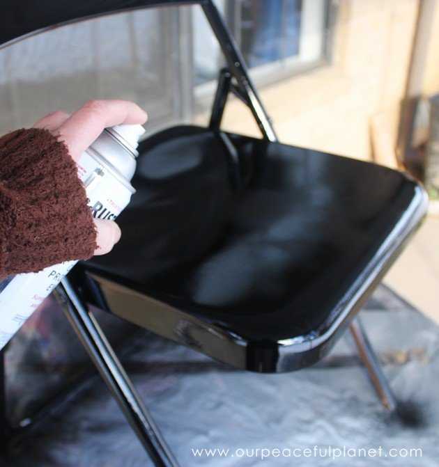 We'll show you how to easily do a folding chair makeover with some spray paint and vinyl labels for a classy, quick and inexpensive addition to any room!