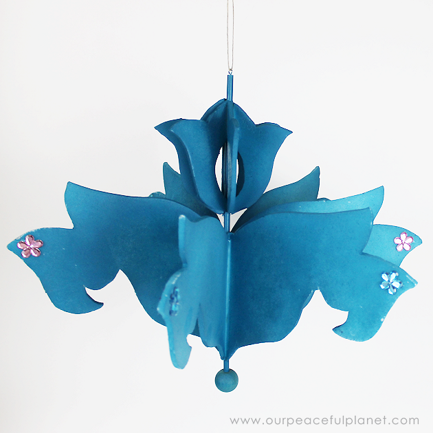 Add a little whimsy to any room with a cardboard chandelier! Grab our free pattern, some cardboard , a hot glue gun and paint. Add any bling you like! 