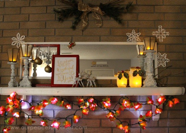 Create a gorgeous mantle using homemade Christmas decorations that cost very little if nothing to make & don't forget to download our free quote to display!
