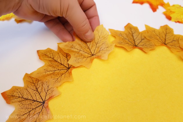 These quick autumn placemats were made from a piece of felt and fall leaves purchased at the dollar store. They turned a fall table into something elegant!