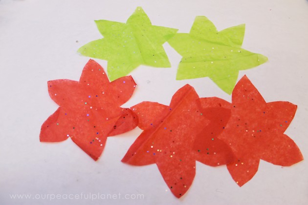 We'll show you how to make these inexpensive and beautiful poinsettia lights using normal LED twinkle lights, red and green tissue paper, and floral tape.