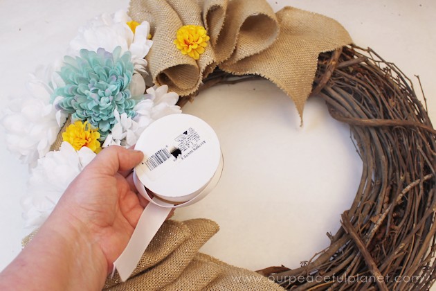 We'll show you how to hang any wreath with a piece of ribbon and a thumbtack leaving no mark on your door! Toss in a small cork and it stores wonderfully!