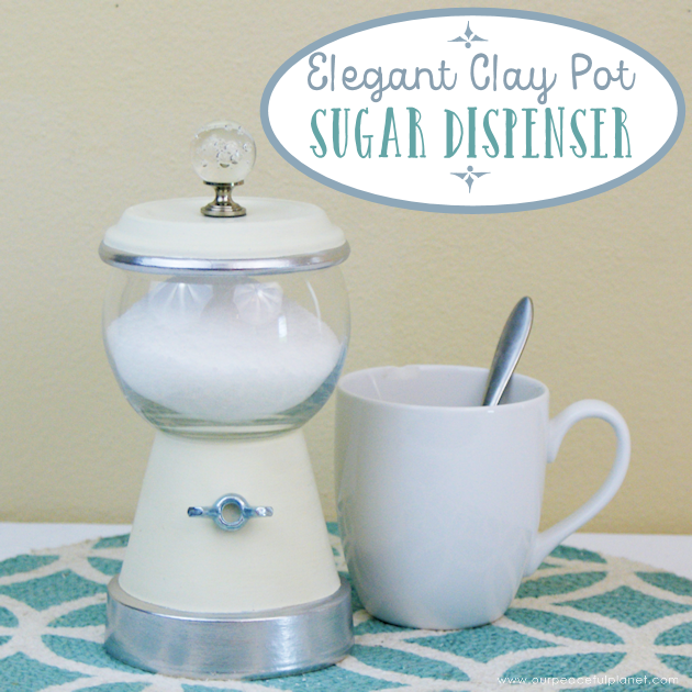 This elegant DIY sugar dispenser will add some beauty to your kitchen. It's made from a clay pot and a glass bowl and is inexpensive and simple to create!