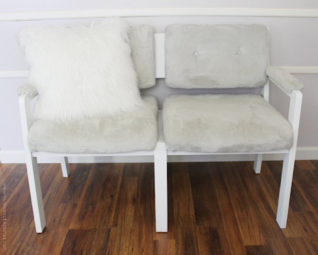 Watch how two $2 thrift store office chairs were transformed into a gorgeous comfy bench seat with nothing more than some paint and $6.00 of material.