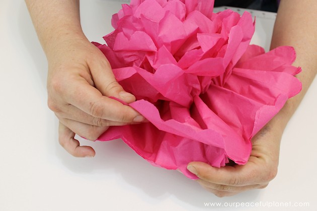 For simple & unique window treatment ideas you'll love our tissue paper flower window toppers. The gorgeous flowers cost pennies & take minutes to make.