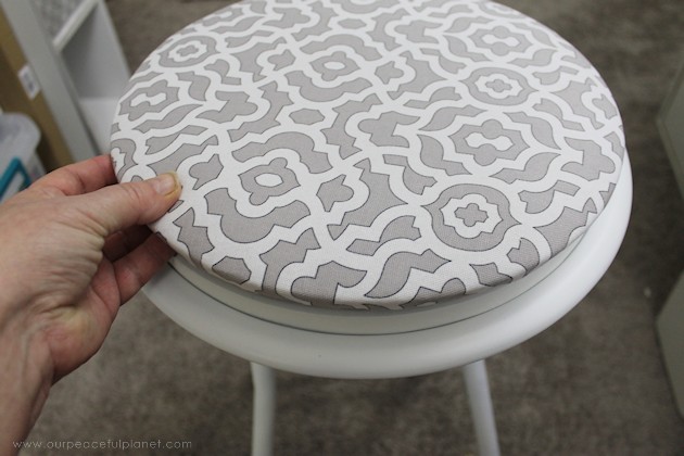This cheap folding stool from Amazon was for my craft room. It just needed a little love. i.e. paint and material plus a wood circle to make it tad higher. I also added the feature of making the fabric top removable in case I want to change the color at some point.