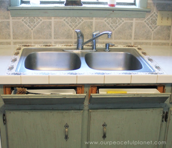 Get rid of sink clutter and utilize wasted space by instlaling tip out hidden trays in your kitchen!